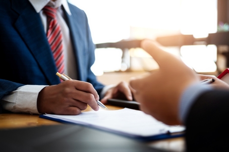 person consulting with a lawyer