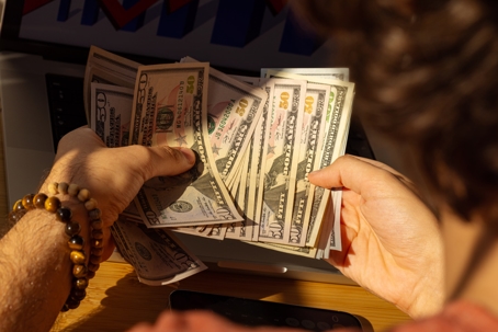person counting money