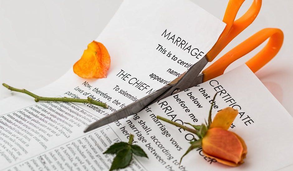 marriage certificate cut in half with scissors 
