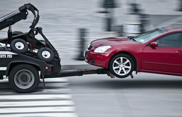 red car towed